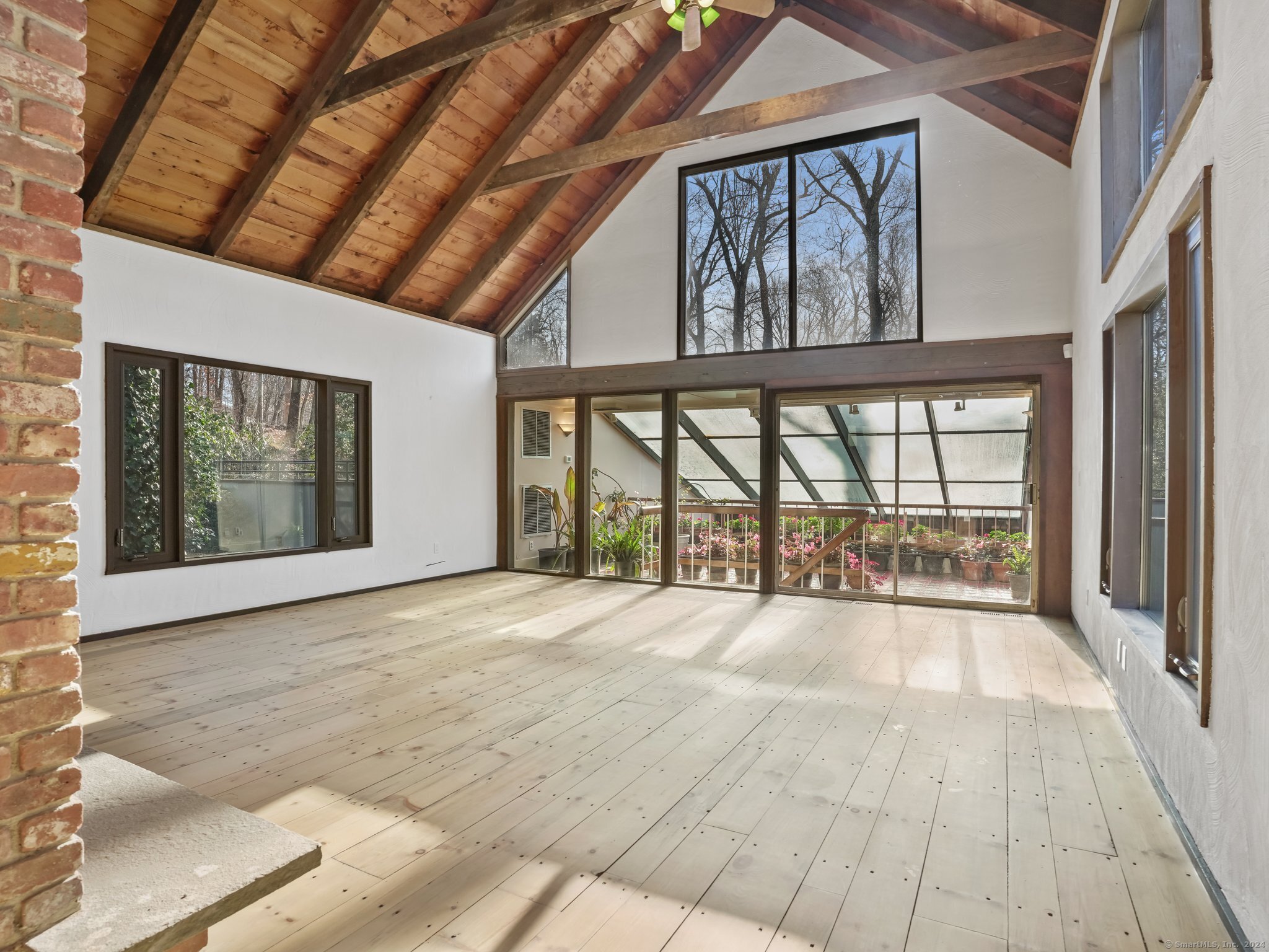8 Bayberry Ridge Road Westport, CT 06880 - Photo 19 of 39 The Great Room with Solarium behind.