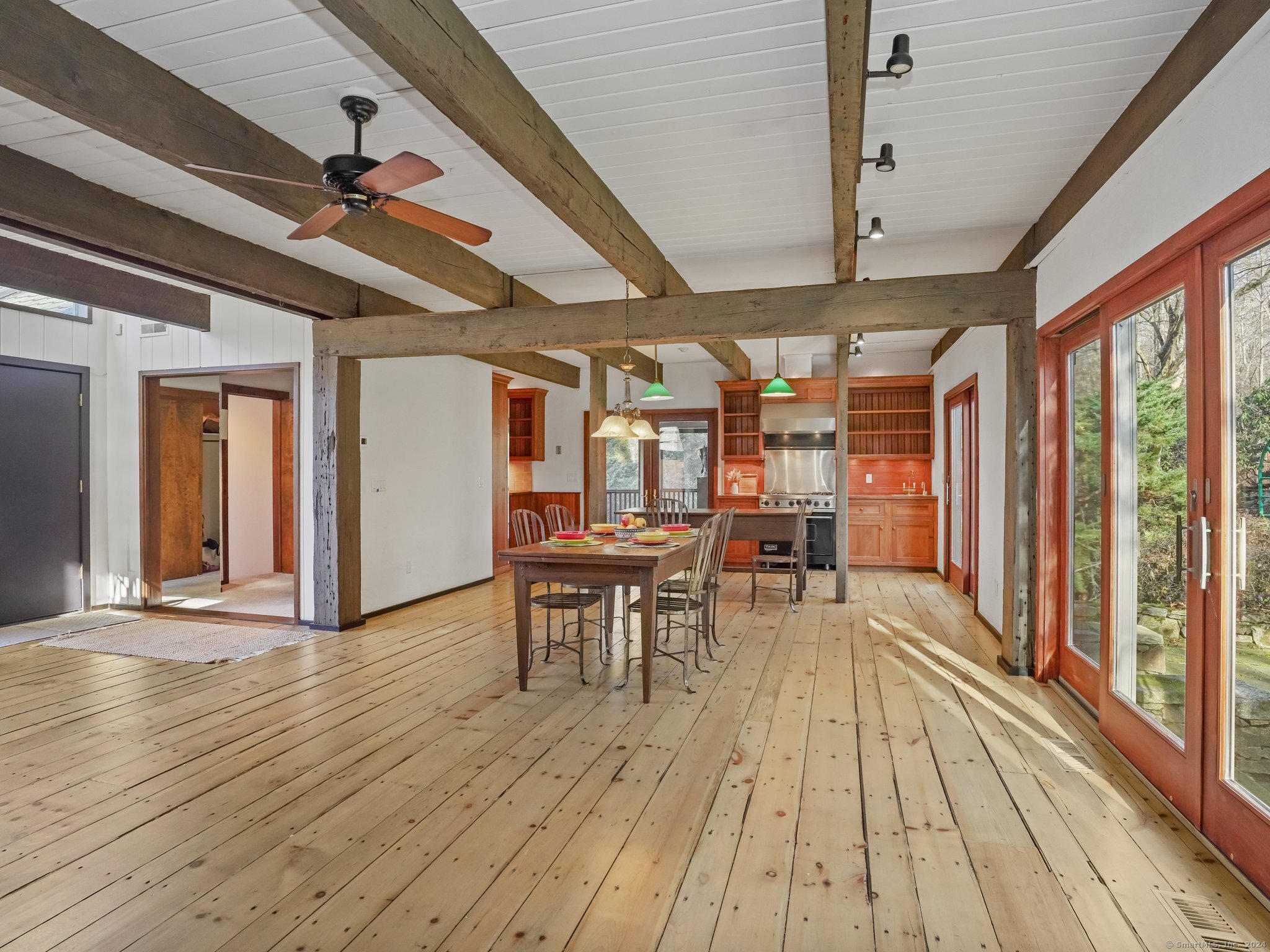 8 Bayberry Ridge Road Westport, CT 06880 - Photo 22 of 39 a view of a dining room with furniture window and wooden floor