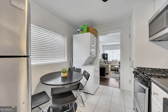 a kitchen with a sink cabinets and counter space