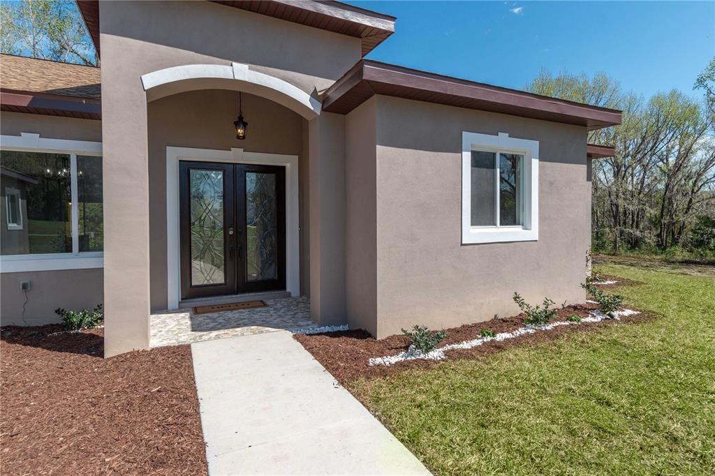 4869 Northwest 101st St Road Ocala, FL 34482 - Photo 4 of 48 Beautiful front doors!