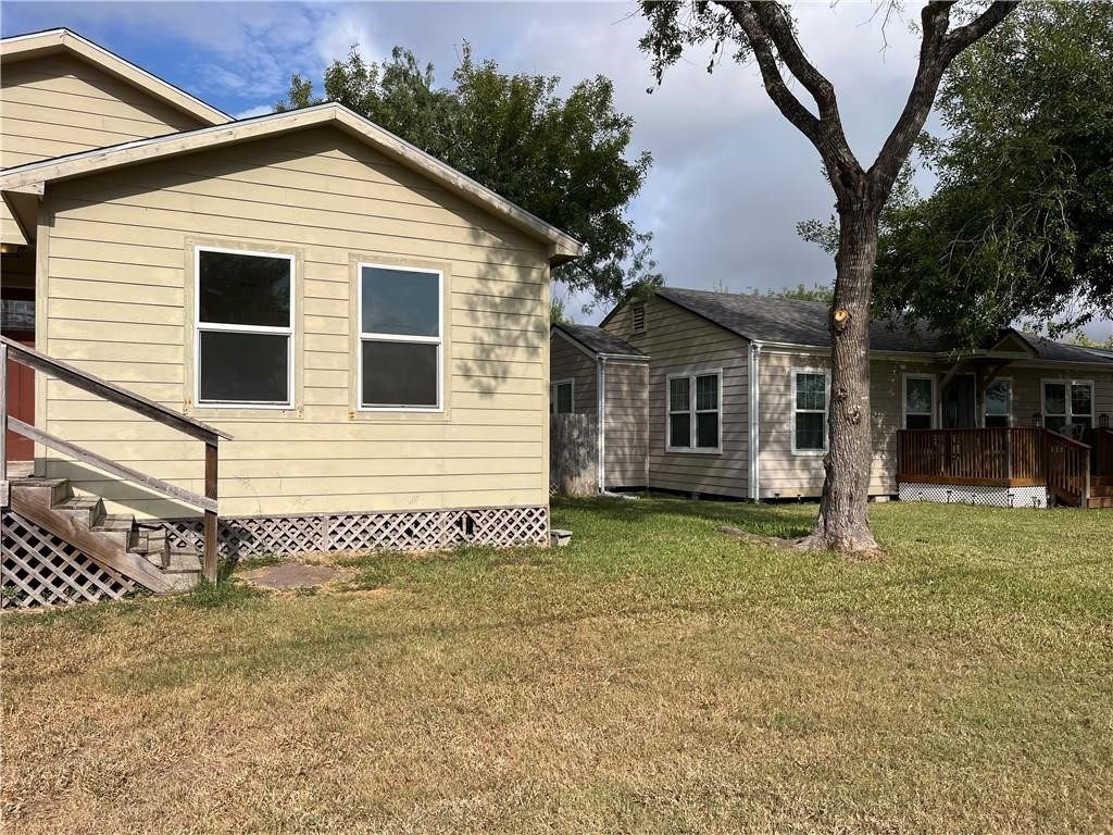 2525 Ave B Ingleside, TX 78362 - Photo 9 of 9 a front view of a house with a yard