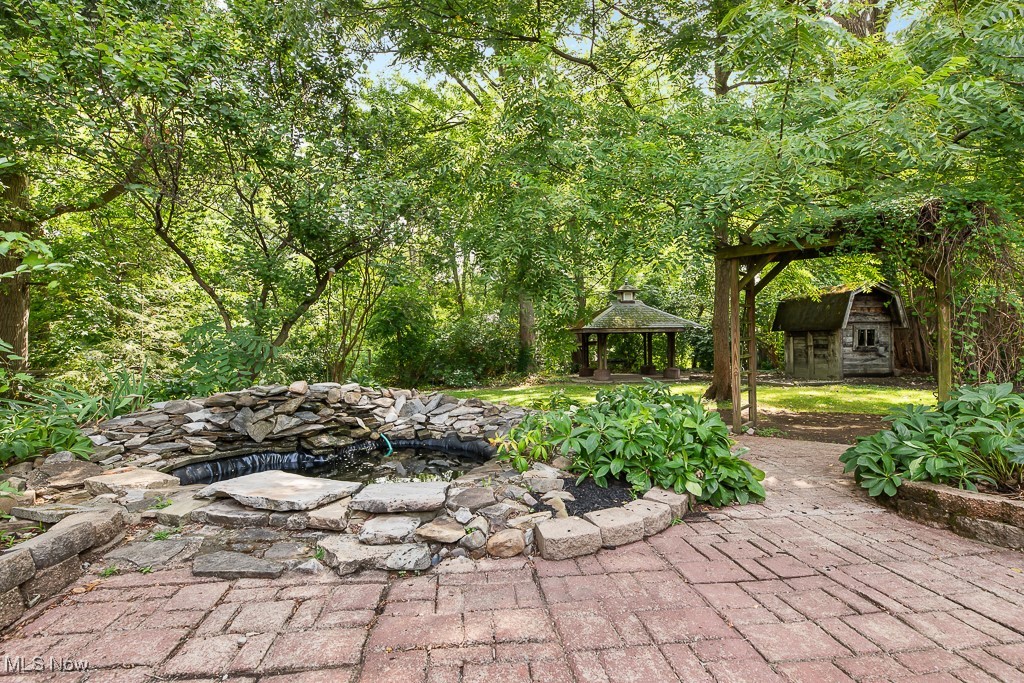 9049 Prospect Road Strongsville, OH 44149 - Photo 46 of 50 View of patio featuring a gazebo and a shed