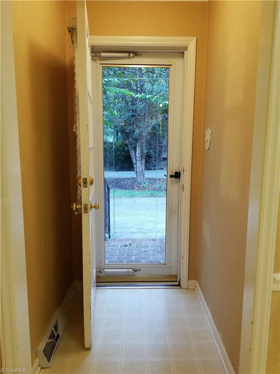 1602 Beechtree Road Greensboro, NC 27408 - Photo 17 of 24 Side Entry into the Kitchen.