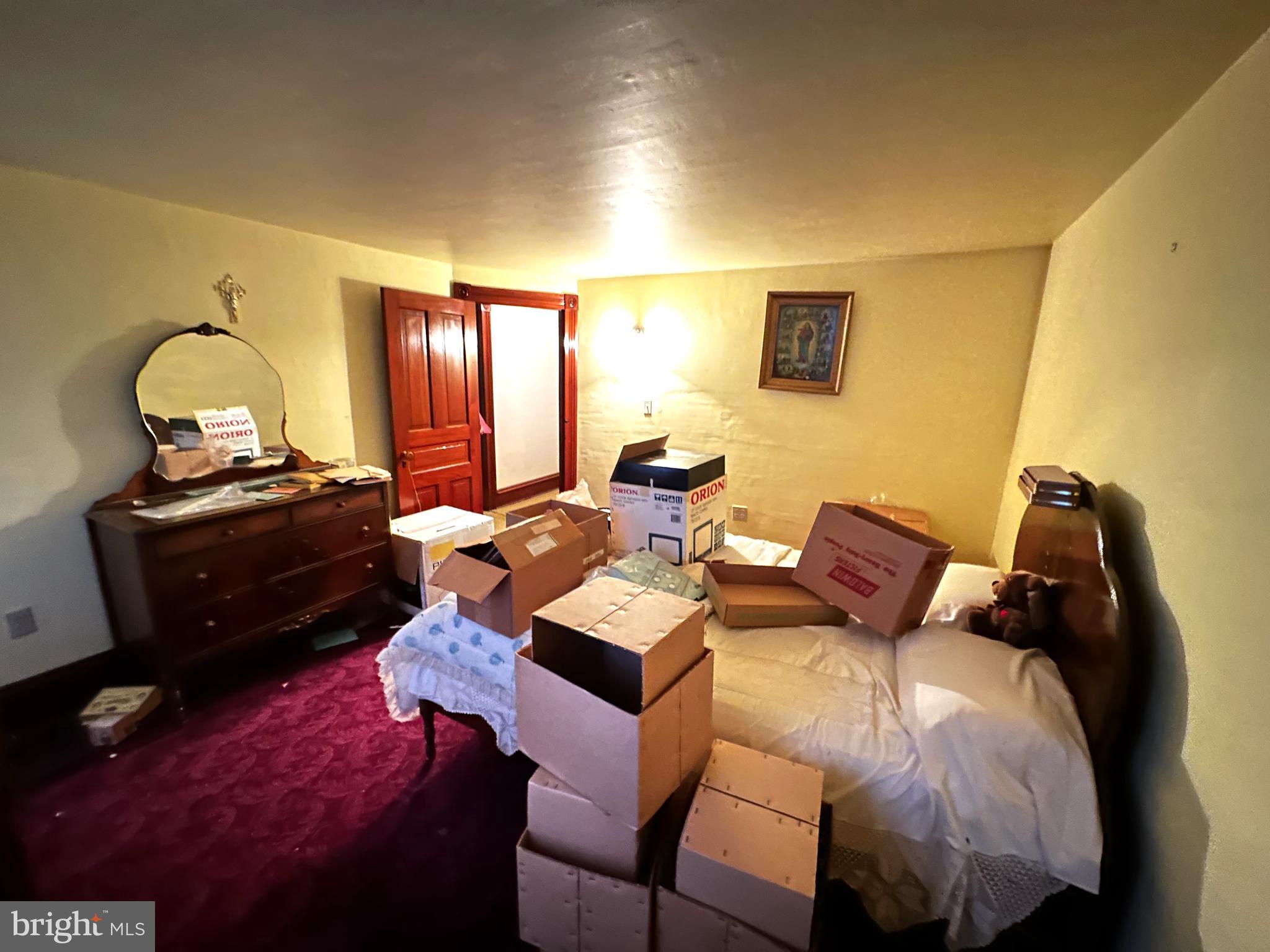 239 East Hazard Street Summit Hill, PA 18250 - Photo 23 of 39 a bed room with a bed and furniture