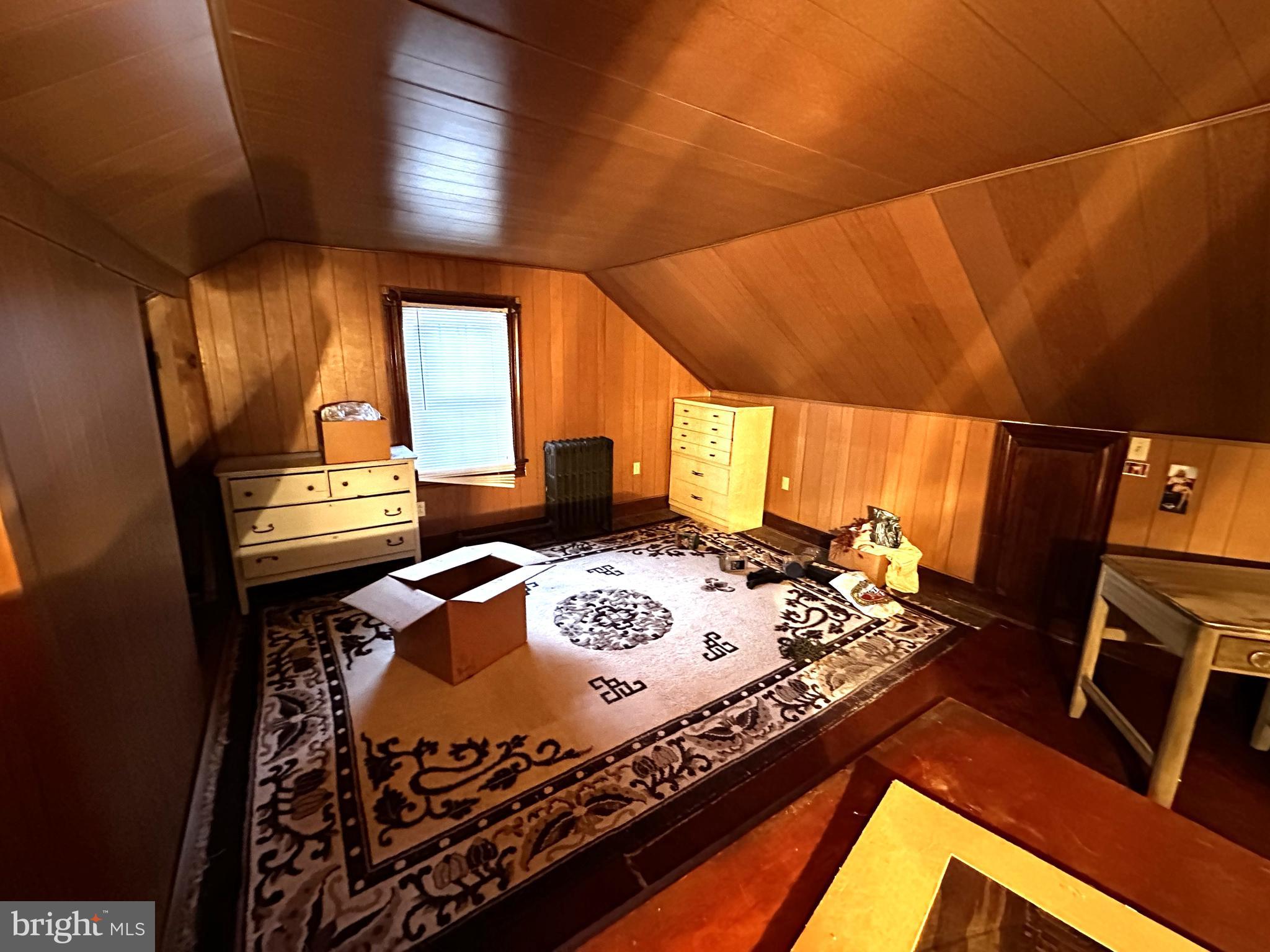 239 East Hazard Street Summit Hill, PA 18250 - Photo 26 of 39 a bed sitting in a bedroom next to a window