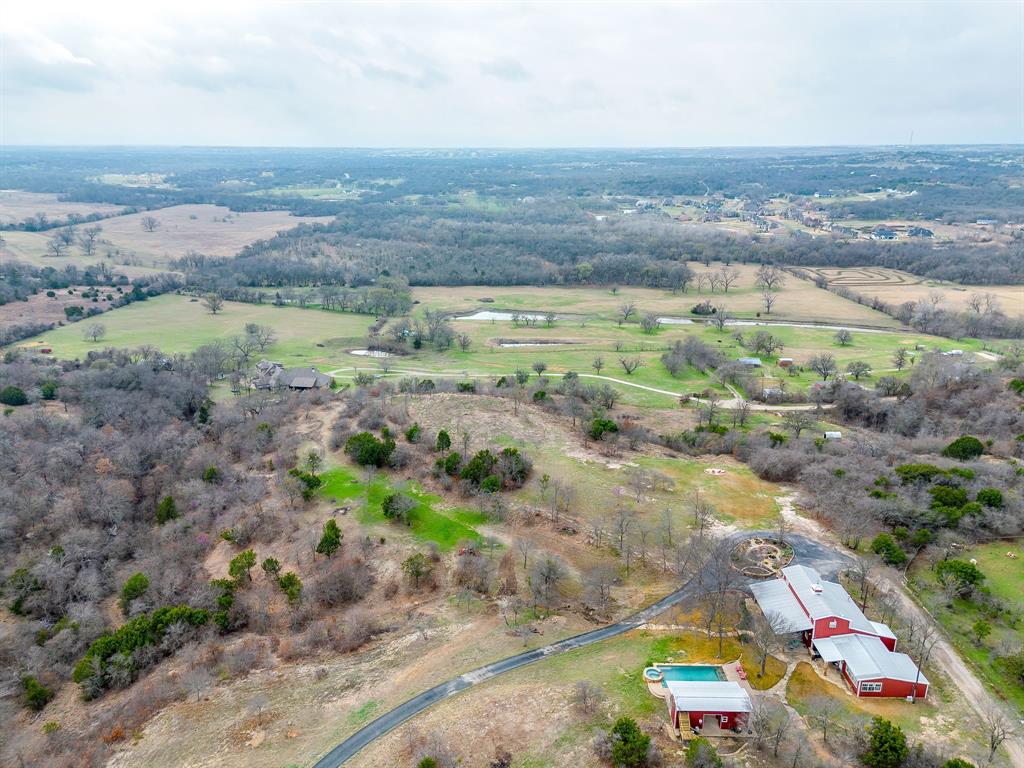 450 Quail Ridge Road Aledo, TX 76008 - Photo 4 of 22 an aerial view of beach and residential houses with outdoor space