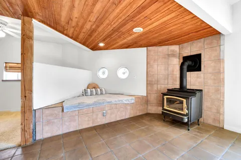 a bathroom with a sink a large mirror and vanity