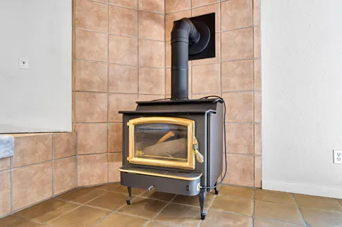 a bathroom with a sink and a large window