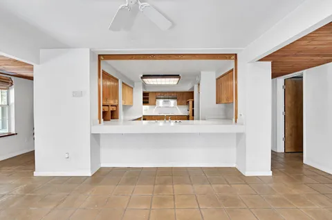 a view of a air conditioner and window in a room