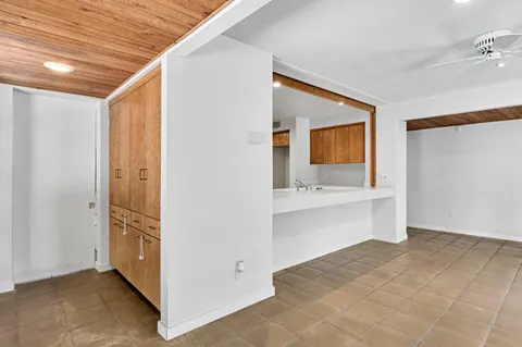 a view of an empty walk in closet