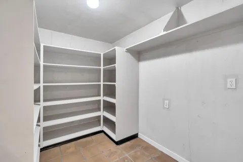 a view of a swimming pool with an outdoor space and seating area