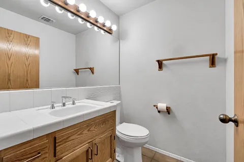 a bathroom with a sink and a shower