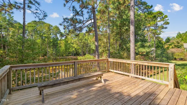 a view of balcony with wooden floor
