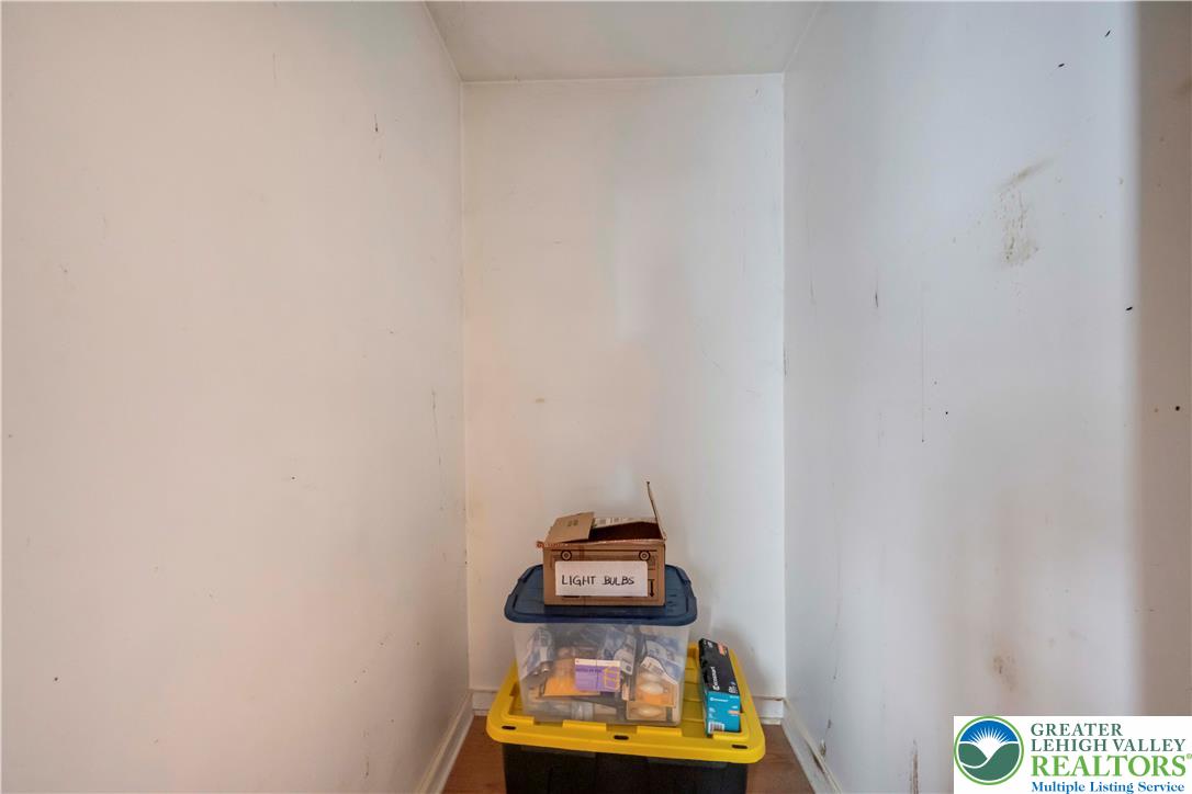 384 Henry Road Nazareth, PA 18064 - Photo 32 of 54 An enclosed storage alcove provides useful utility space with wood flooring.