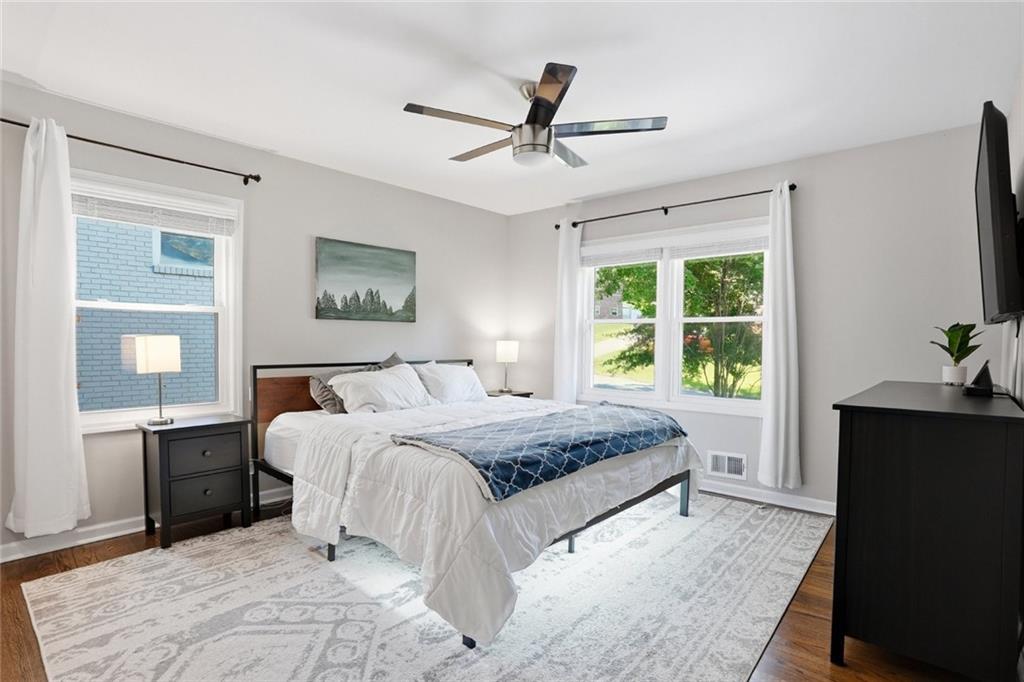 1430 Thomas Road Decatur, GA 30030 - Photo 15 of 42 a bedroom with a large bed and a window