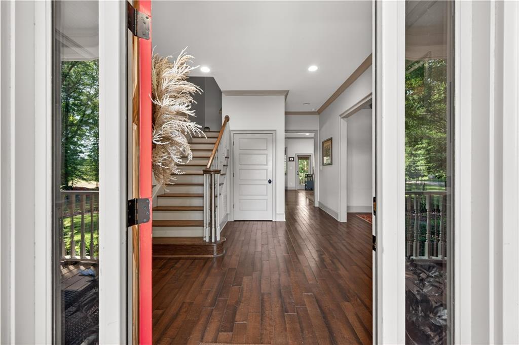 632 Geiger Road Jefferson, GA 30549 - Photo 8 of 55 a view of a hallway with wooden floor and entryway
