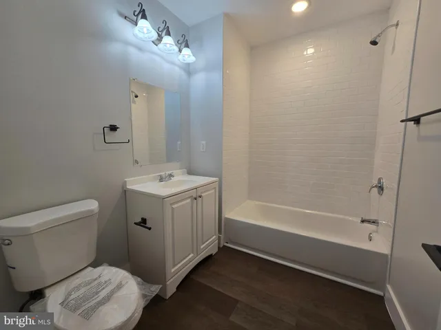 a close up of a bathtub in a bathroom