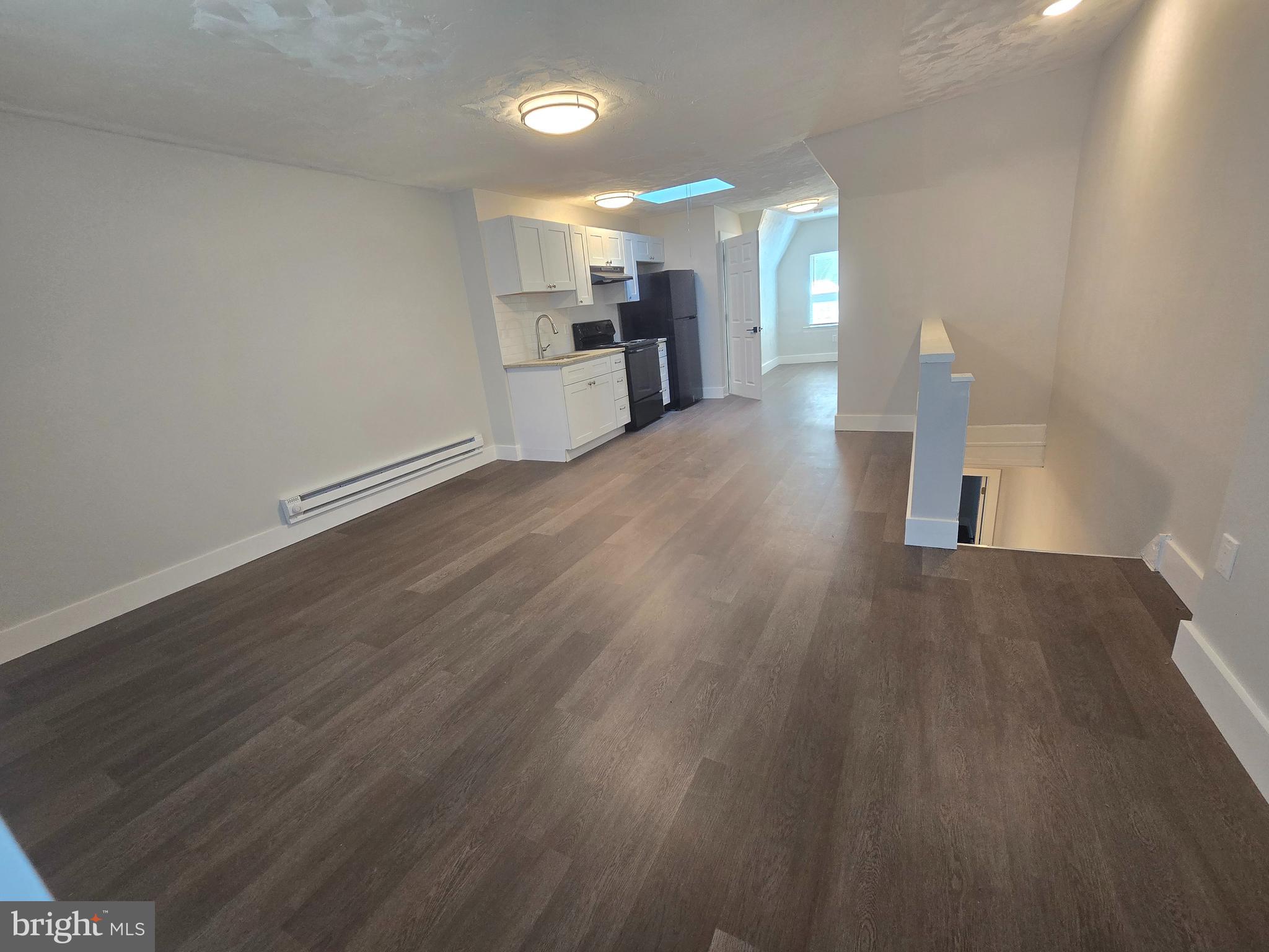 1321 West Wingohocking Street, Unit 2 Philadelphia, PA 19140 - Photo 5 of 26 a view of a kitchen and a sink