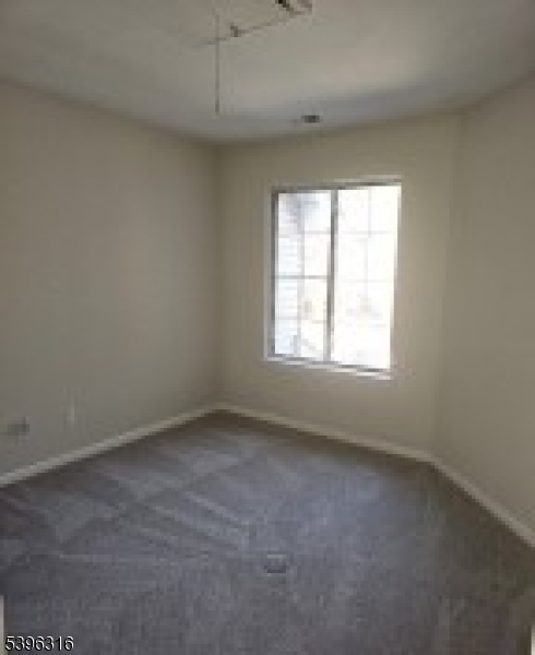 64 Encampment Drive Bedminster, NJ 07921 - Photo 11 of 17 an empty room with a window