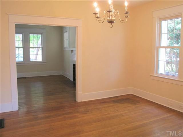 307 Perry Street Raleigh, NC 27608 - Photo 4 of 11 Spacious and bright dining room is of the several nice features of this home. Dining Room