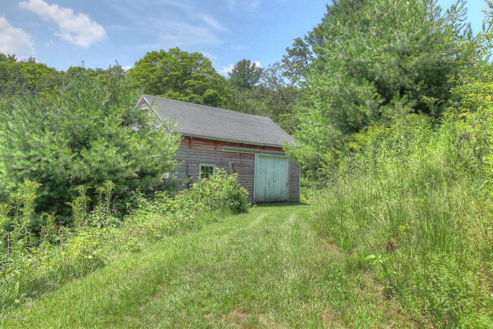 285 North Beech Plain Road Sandisfield, MA 01255 - Photo 8 of 40 a view of a house with a yard