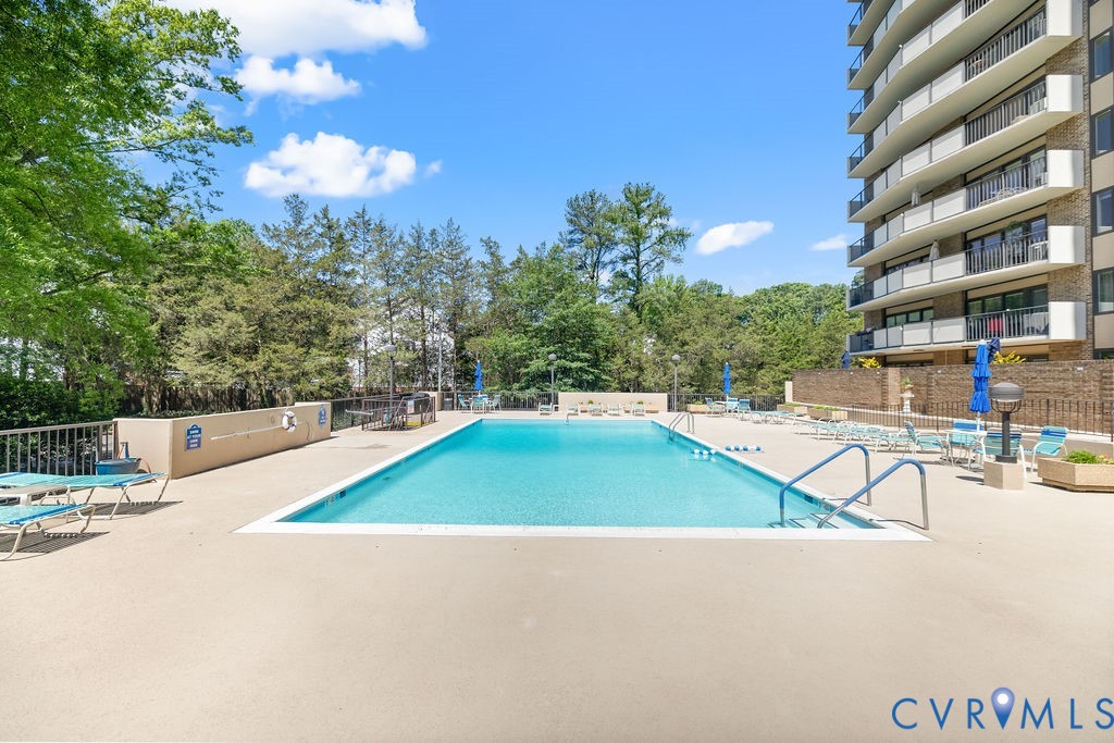 2956 Hathaway Road, Unit U704 Richmond, VA 23225 - Photo 37 of 42 Outdoor swimming pool surrounded by a spacious con