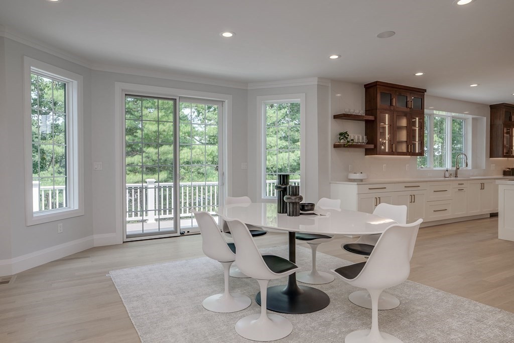 68 Clarke Circle Needham, MA 02492 - Photo 14 of 40 a view of a dining room with furniture