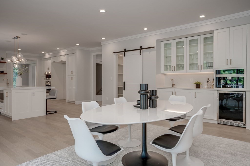 68 Clarke Circle Needham, MA 02492 - Photo 15 of 40 a view of a dining room with furniture and window