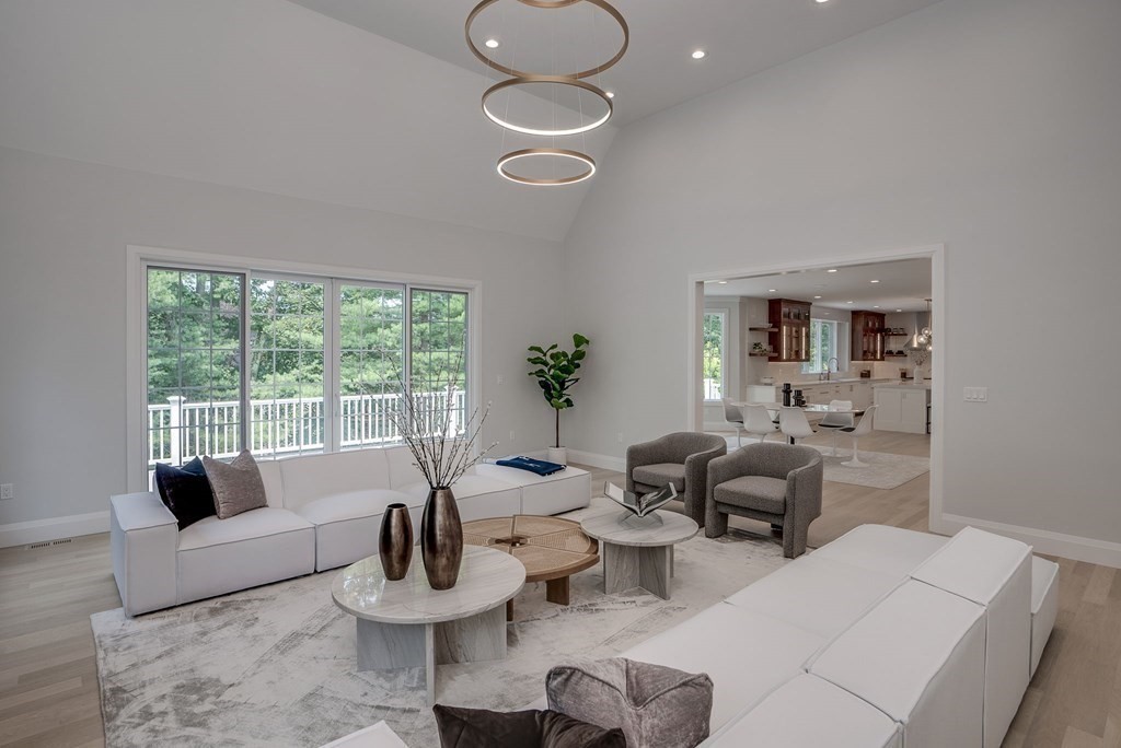 68 Clarke Circle Needham, MA 02492 - Photo 17 of 40 a living room with furniture and a large window