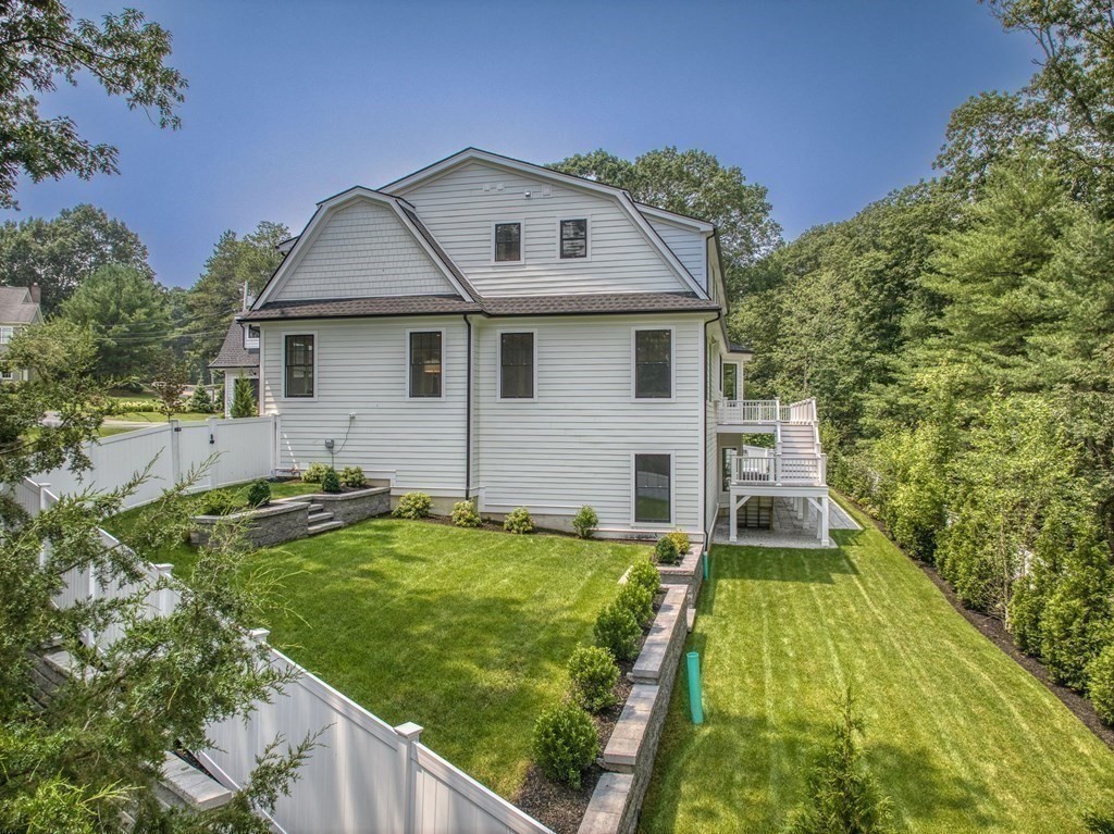 68 Clarke Circle Needham, MA 02492 - Photo 36 of 40 a front view of house with yard