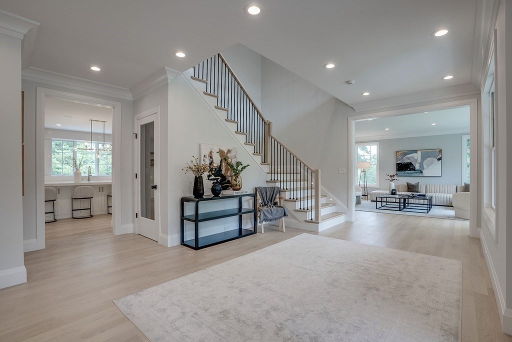 68 Clarke Circle Needham, MA 02492 - Photo 5 of 40 a living room with furniture and a table