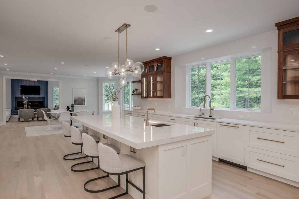 68 Clarke Circle Needham, MA 02492 - Photo 10 of 40 a kitchen with counter top space and a sink