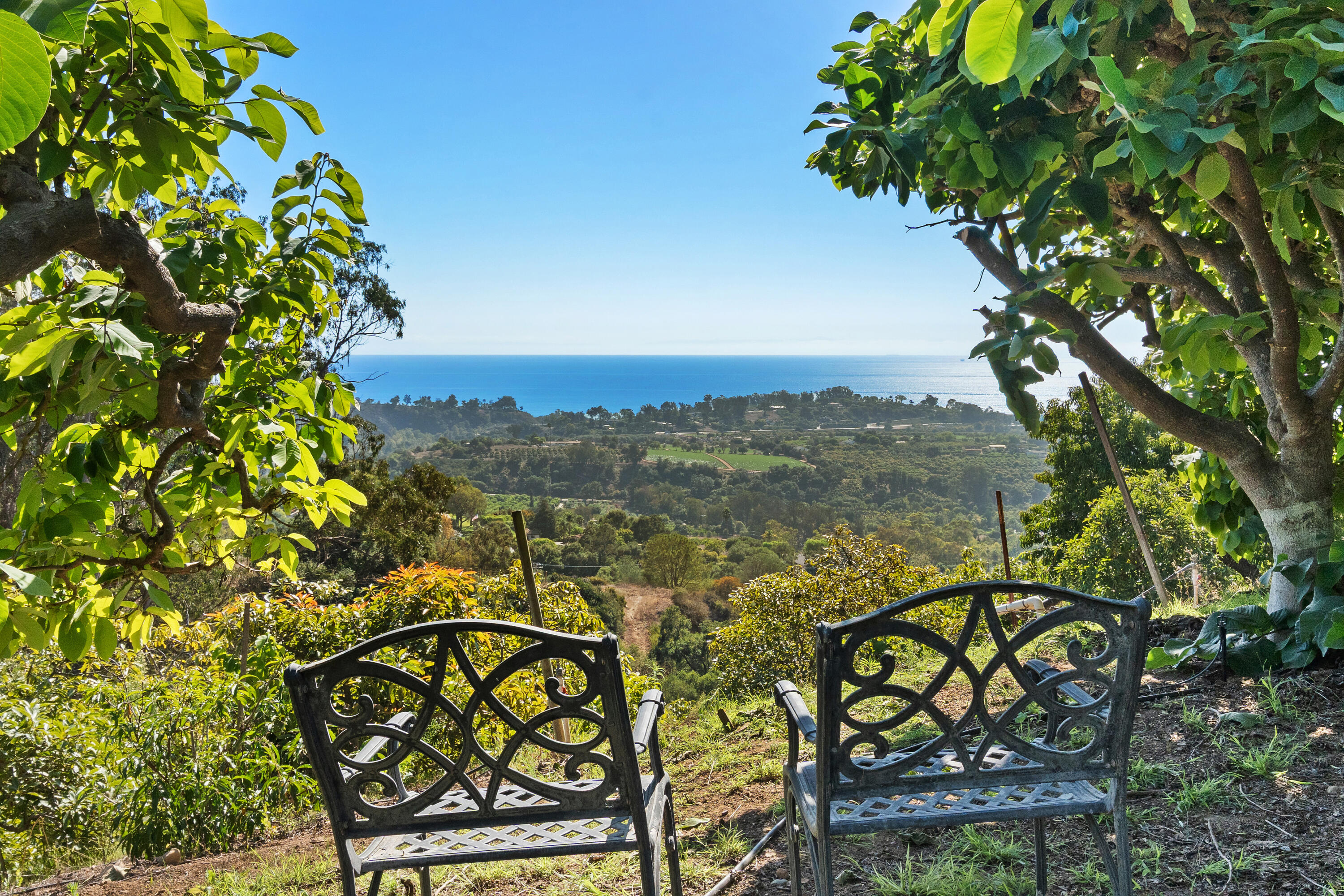 7401 Shepard Mesa Road Carpinteria, CA 93013 - Photo 4 of 14 a view of a lake with a mountain in the background
