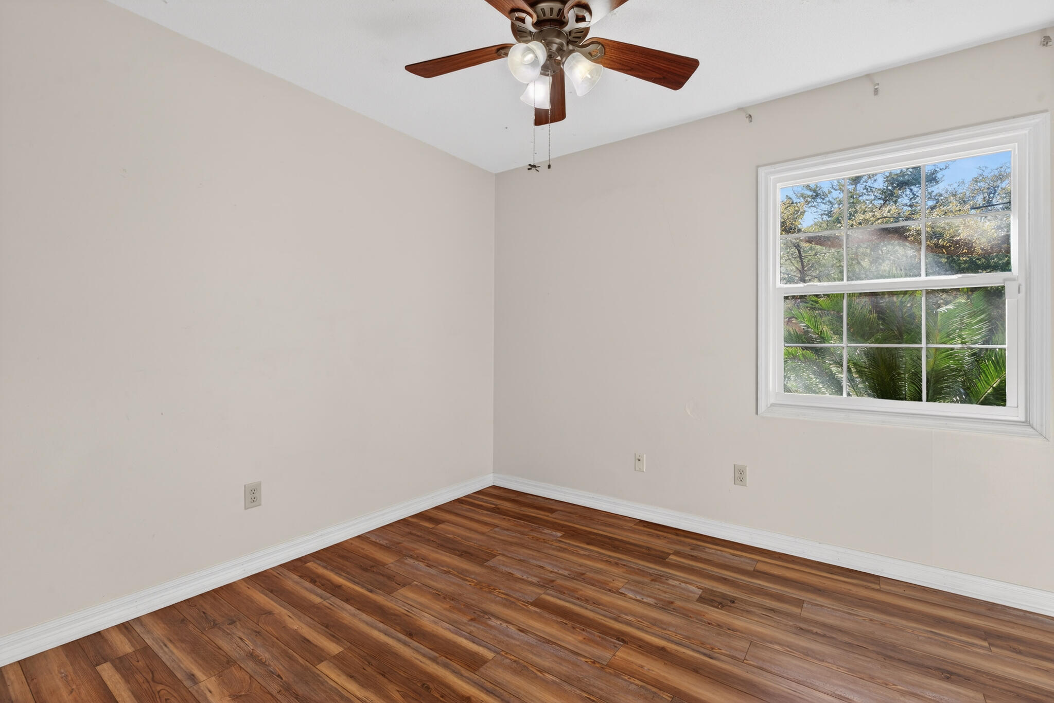 9 Walnut Avenue Shalimar, FL 32579 - Photo 15 of 61 a view of empty room with wooden floor and fan