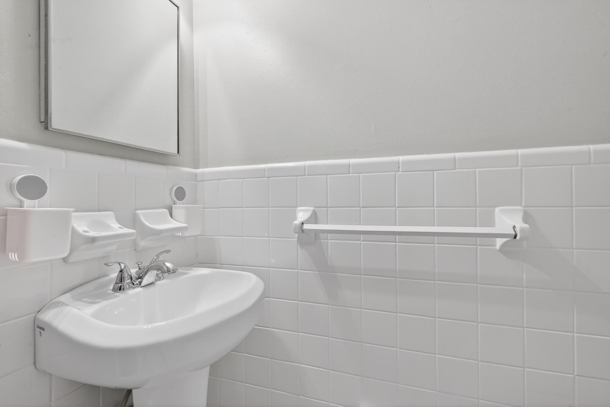 9 Walnut Avenue Shalimar, FL 32579 - Photo 22 of 61 a bathroom with a sink and a mirror