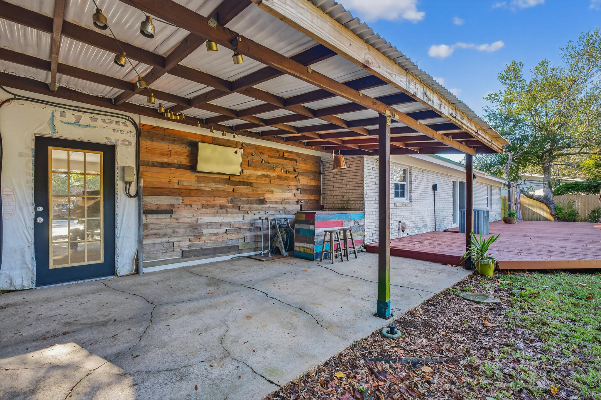9 Walnut Avenue Shalimar, FL 32579 - Photo 25 of 61 a view of a porch with furniture