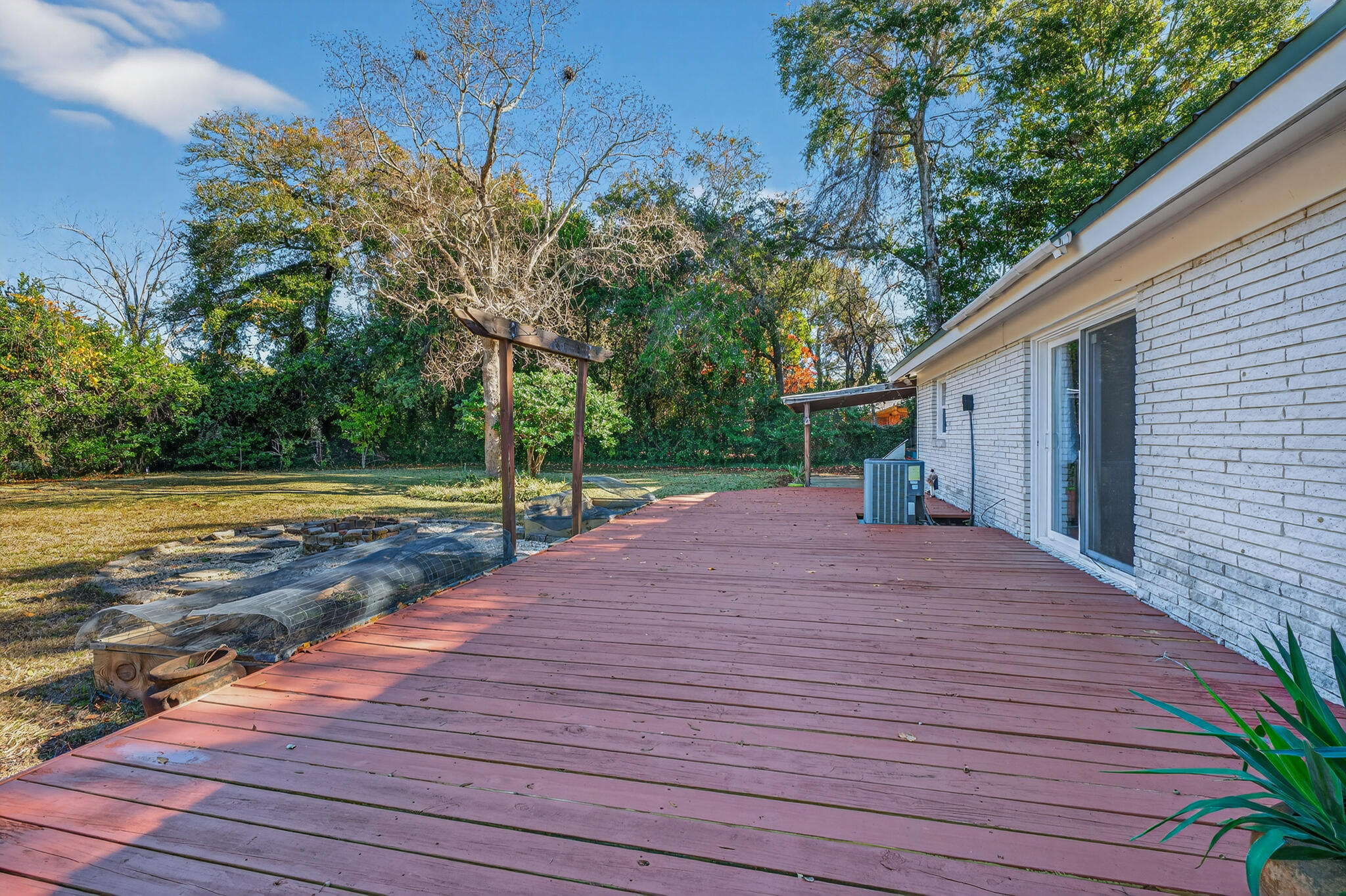 9 Walnut Avenue Shalimar, FL 32579 - Photo 29 of 61 a view of a backyard with large trees