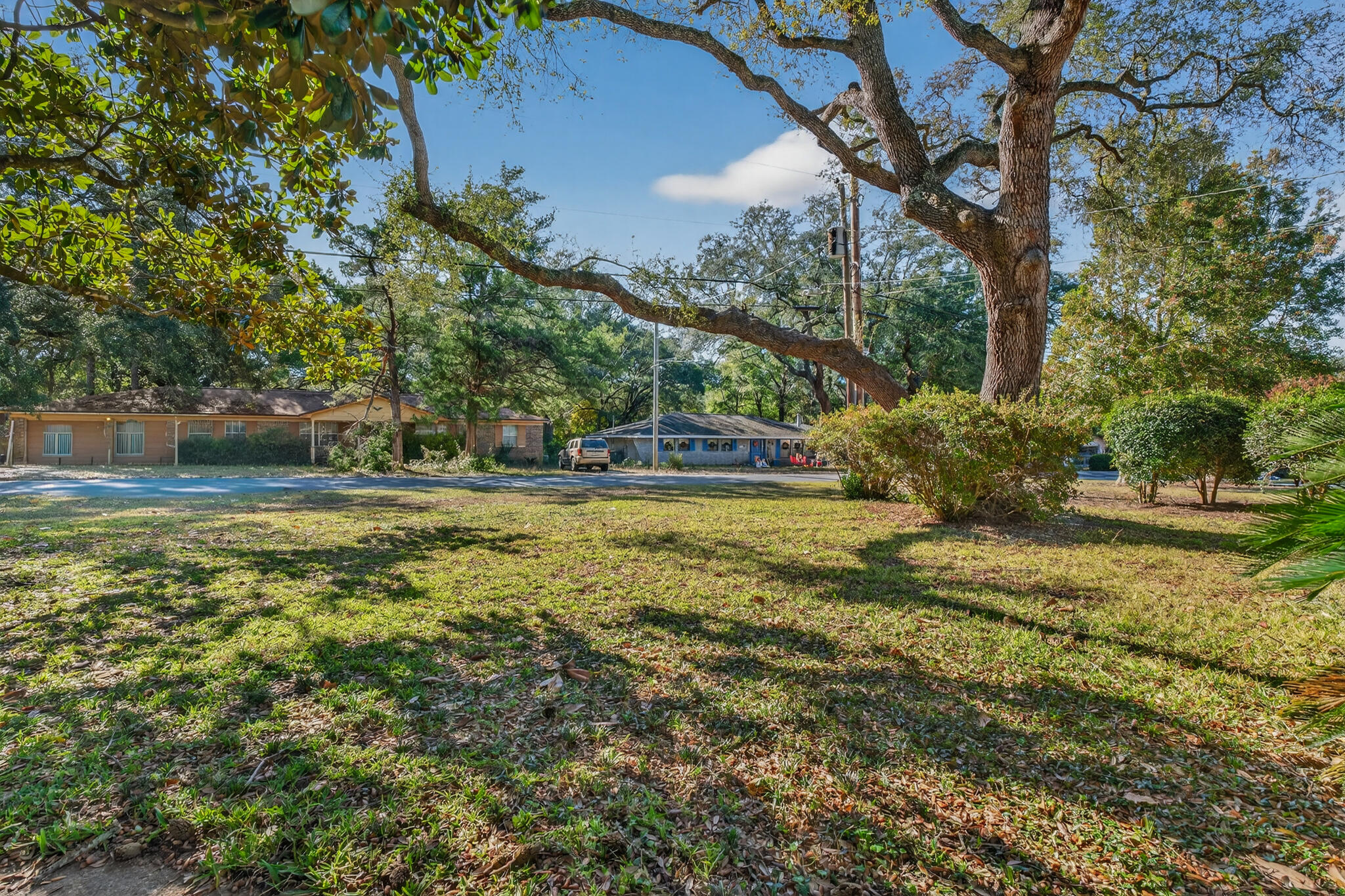 9 Walnut Avenue Shalimar, FL 32579 - Photo 3 of 61 a view of outdoor space with garden