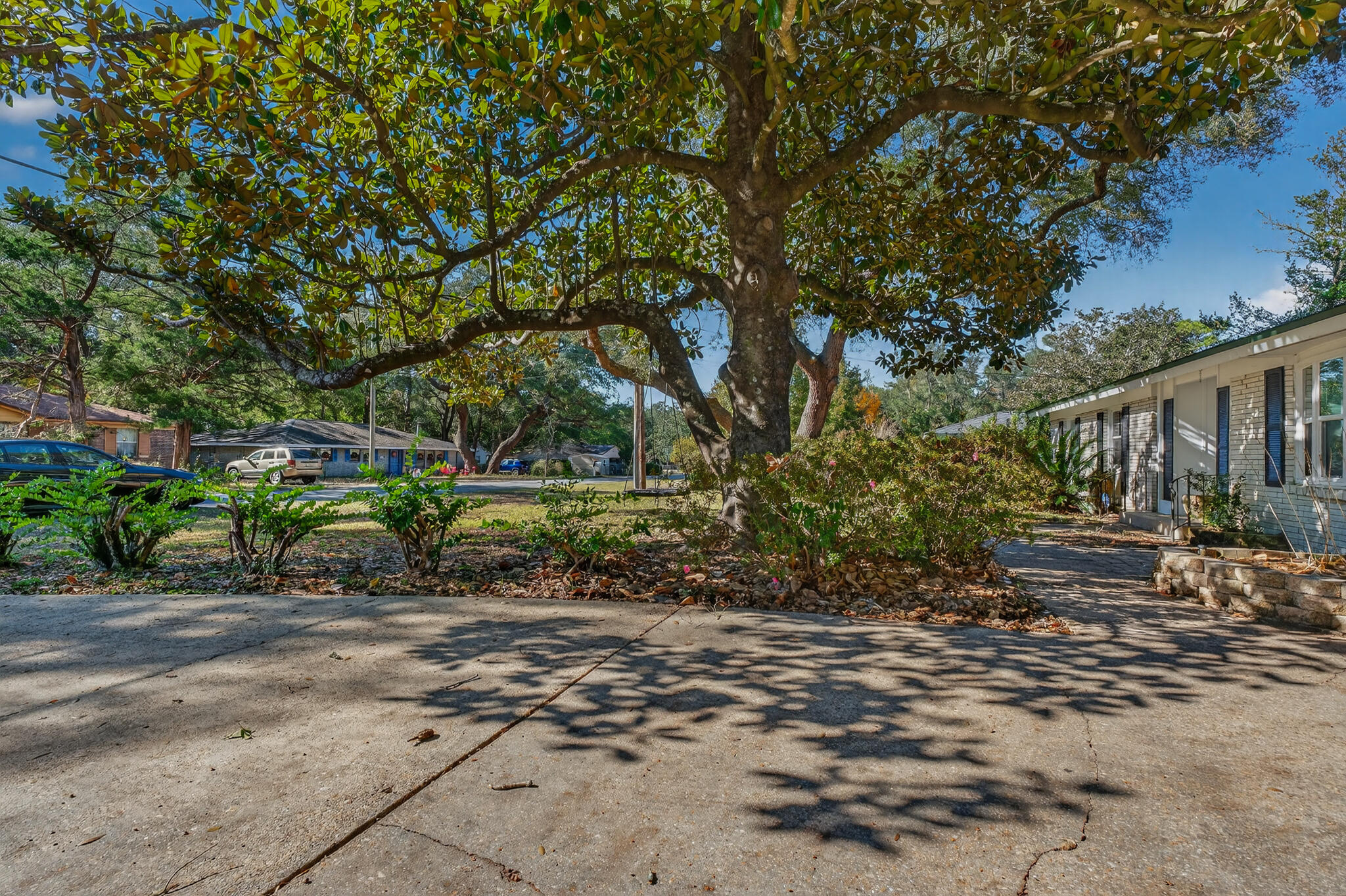 9 Walnut Avenue Shalimar, FL 32579 - Photo 36 of 61 a pathway of a house with a yard