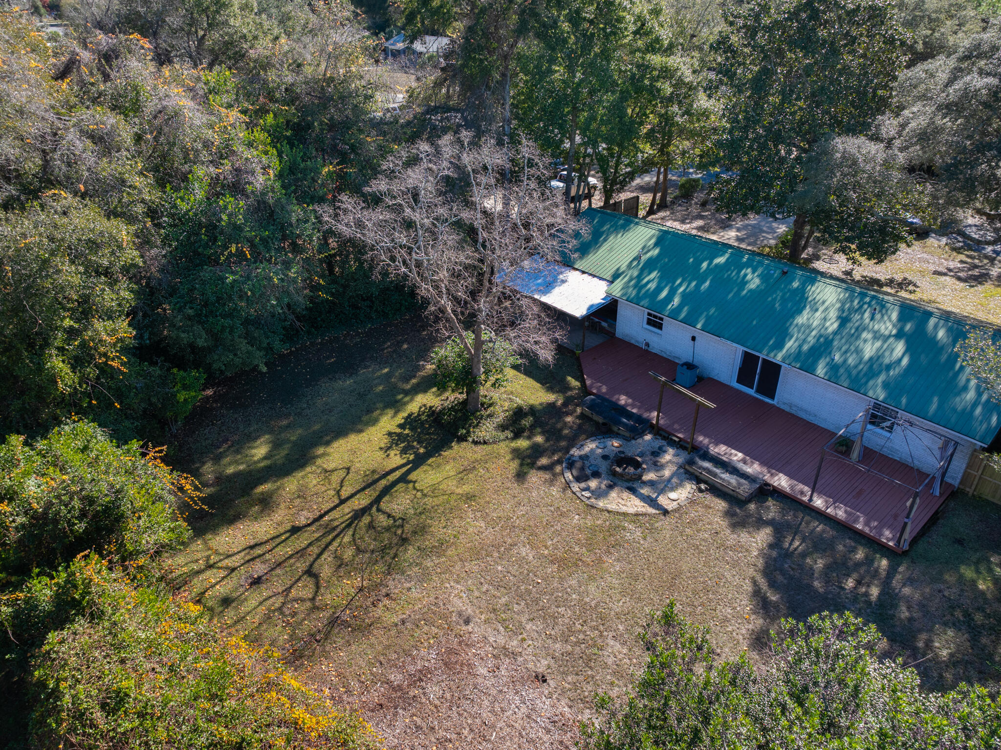 9 Walnut Avenue Shalimar, FL 32579 - Photo 46 of 61 a view of a yard with wooden fence