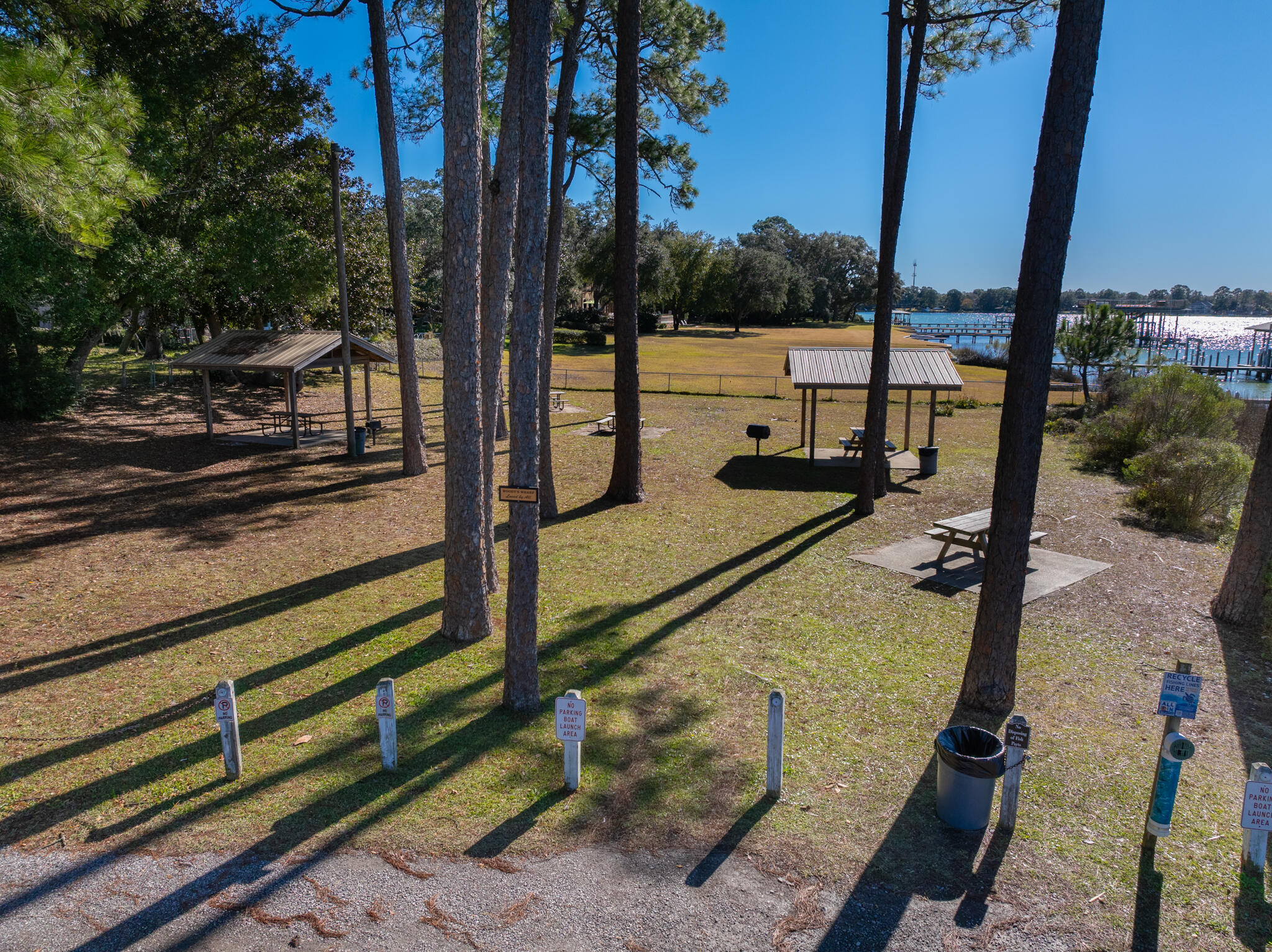 9 Walnut Avenue Shalimar, FL 32579 - Photo 54 of 61 a view of a balcony with floor to ceiling windows and wooden fence