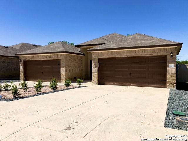 1114 Burek Seguin, TX 78155 - Photo 1 of 16 a front view of a house with a yard