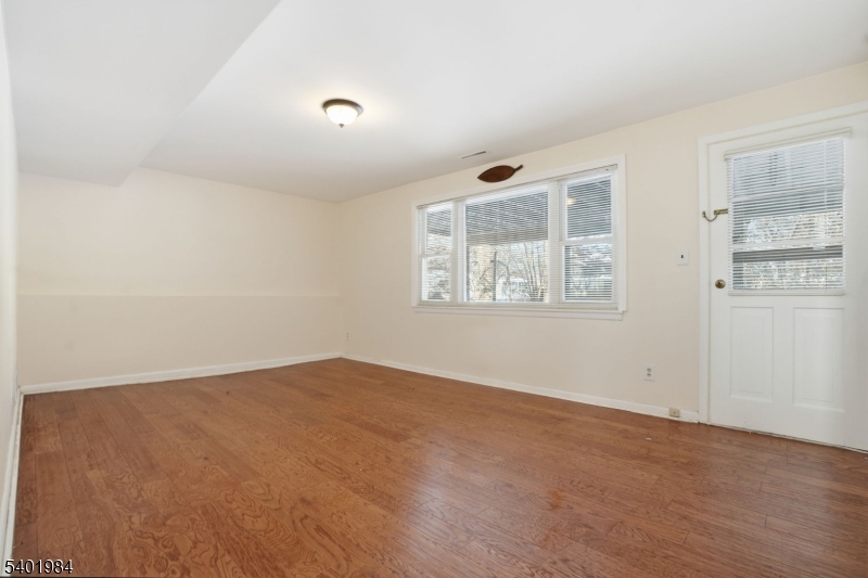 95 Martin Road Livingston, NJ 07039 - Photo 12 of 26 an empty room with windows