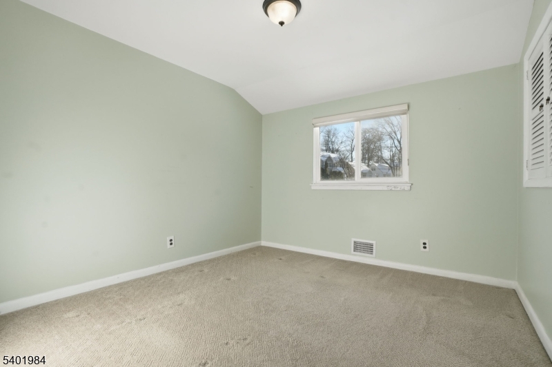 95 Martin Road Livingston, NJ 07039 - Photo 18 of 26 an empty room with windows