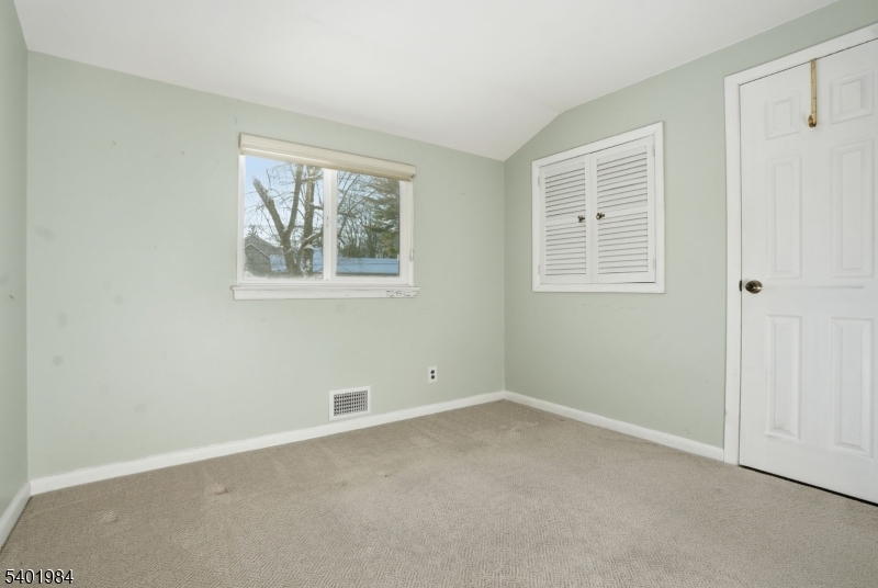 95 Martin Road Livingston, NJ 07039 - Photo 19 of 26 an empty room with windows