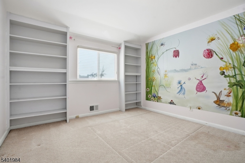 95 Martin Road Livingston, NJ 07039 - Photo 22 of 26 a view of room with cabinet
