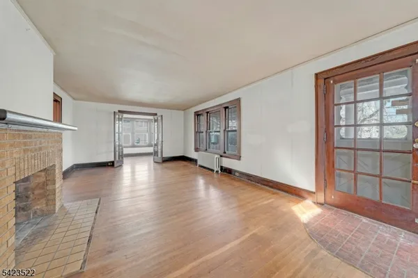 a bathroom with a sink toilet and a mirror