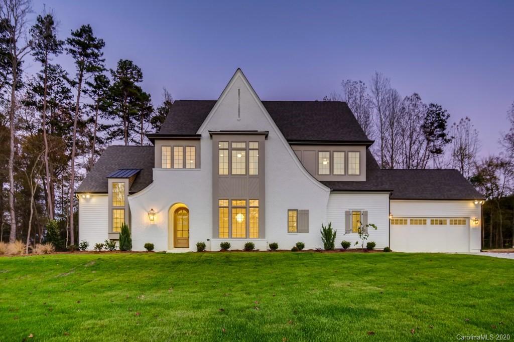 1104 Vision Path Concord, NC 28027 - Photo 1 of 28 a front view of a house with a garden