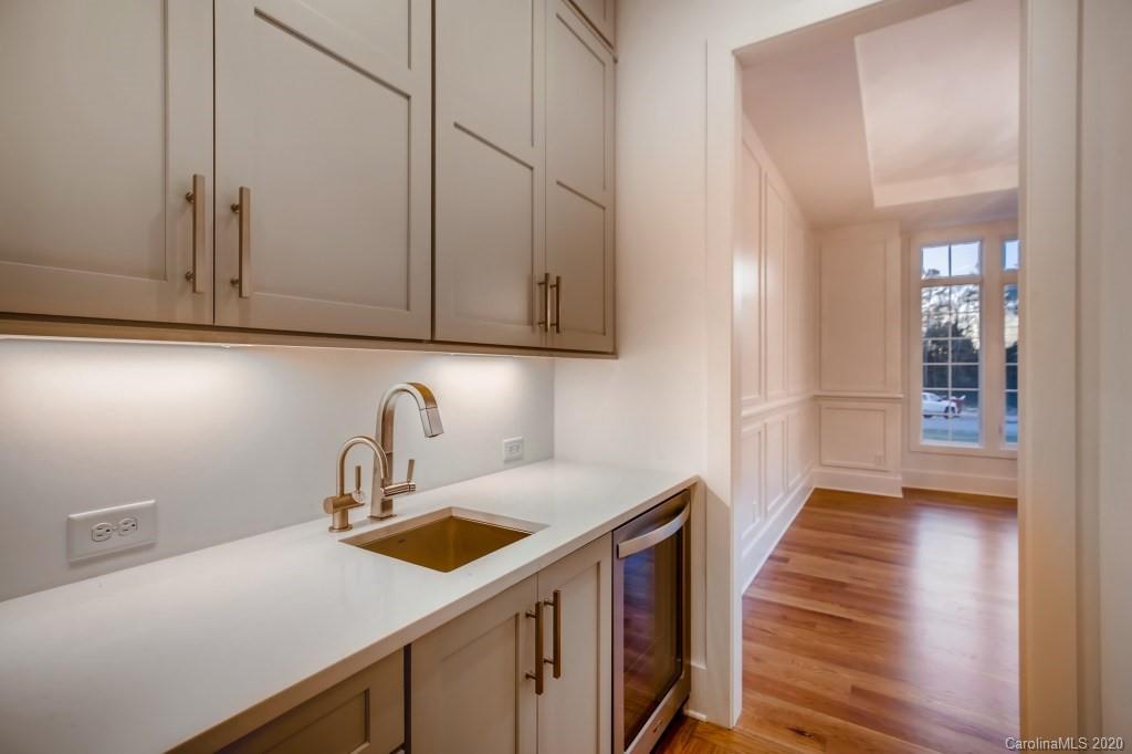 1104 Vision Path Concord, NC 28027 - Photo 12 of 28 a kitchen with a sink cabinets and appliances
