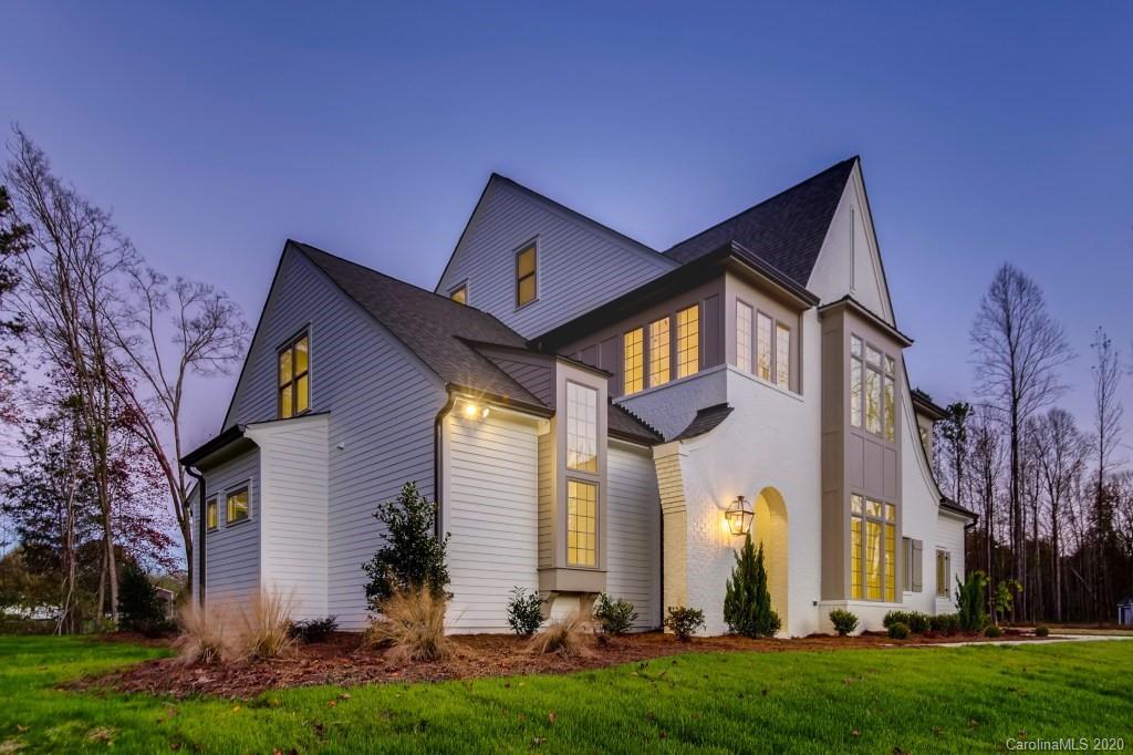 1104 Vision Path Concord, NC 28027 - Photo 3 of 28 a front view of a house with a yard and garage